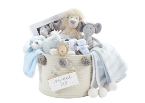 Basket of baby boy related merchandise from Mud Pie