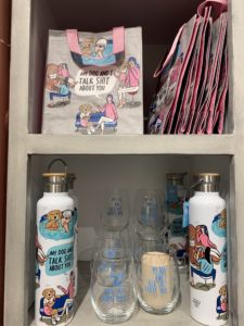 Southern Paws' water bottle and bag display
