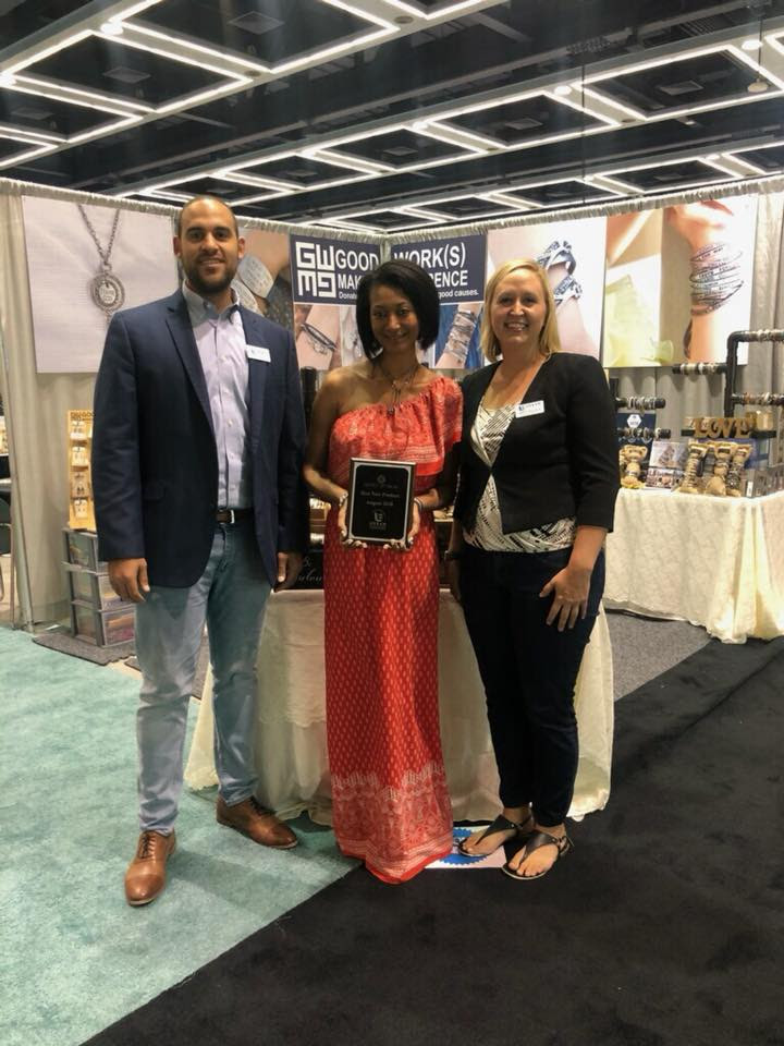  Pictured Above (left to right):  Joseph Lee, show director, Seattle Gift Show; Mimi Teshome, sales representative, Good Work(s) Makes a Difference; Amy Dufour, marketing manager, Seattle Gift Show