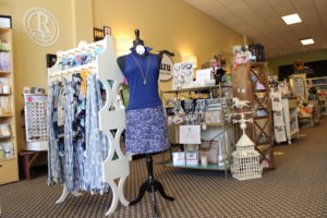 Accessories and Apparel product display at Zazu Gifts