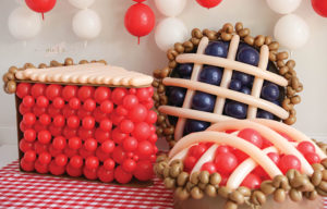 Pie shaped balloon art from Creative Heart Studio. Photo by @weelovephotography.