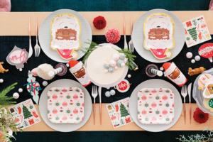 The Holiday Partyware collection by SUNNY&TED creates a Christmas wonderland with Christmas Essential Napkins, Multi-Shade Santa Plates, Jolly Red Ornaments Plates, Cocoa Santa Paper Cups and Cocoa Santa Plates. Photo courtesy of SUNNY+TED