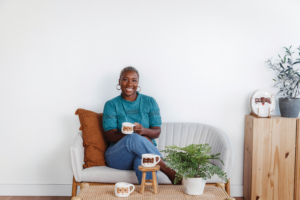 Jasmine Williams launched SUNNY&TED in response to the lack of diversity in home goods after trying to find a Black Santa mug for her firstborn son. She now provides tableware, soft goods, and paperware items with classic Christmas characters in beautiful shades of brown. Photo courtesy of SUNNY+TED