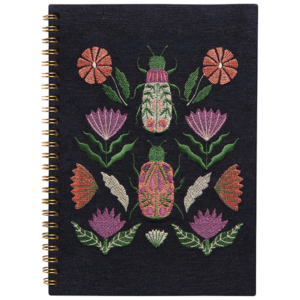Delicate details are woven into the creatures and symbols that adorn the Amulet Notebook by Danica Studio.