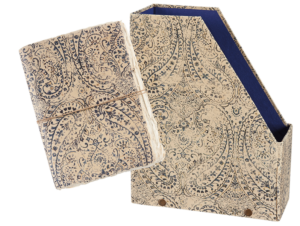 Primitives by Kathy’s Indigo Stationery collection of stationery and desk accessories features ornate indigo designs using paper and cotton materials to create unique textures and aged details.