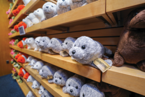 The gift shop offers plush and toys, as well as apparel, home décor and jewelry.
