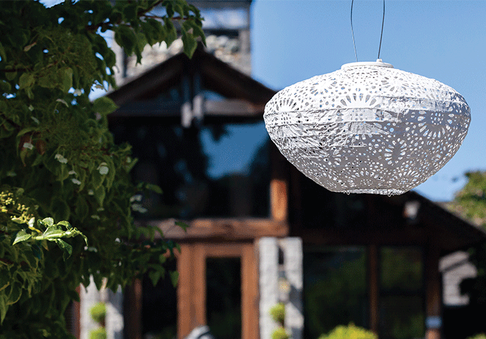 With a unique crown shape and a punch pattern reminiscent of Chantilly lace, the Soji Stella Crown Solar Lantern looks delicate and ornate by night. Handmade from white Tyvek® this solar lantern is set to dress up any outdoor occasion, from Allsop Home & Garden